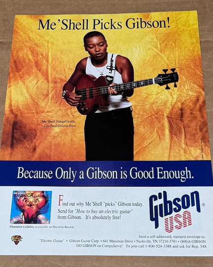 Gibson Guitars - Les Paul Deluxe Bass - Me'Shell Ndege'Ocello - 1994 Print Ad