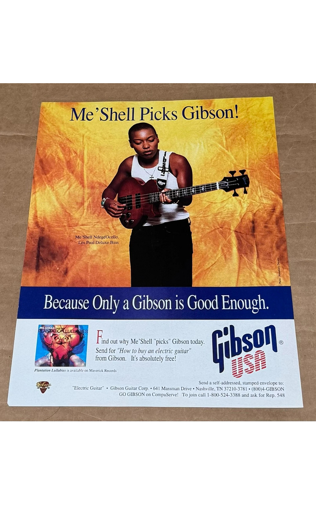 Gibson Guitars - Les Paul Deluxe Bass - Me'Shell Ndege'Ocello - 1994 Print Ad