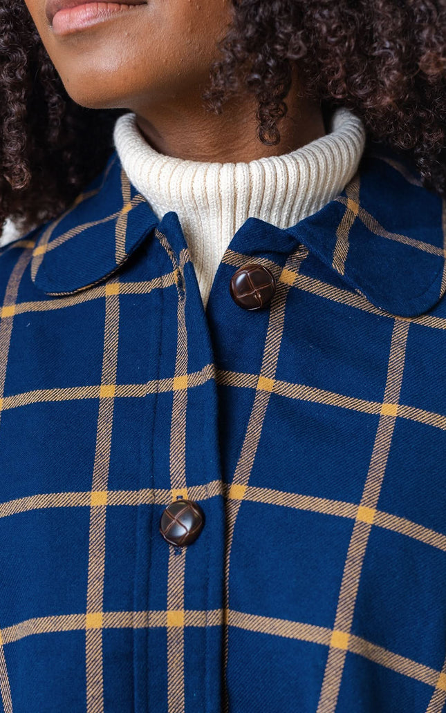 Woven Cape with Button Front